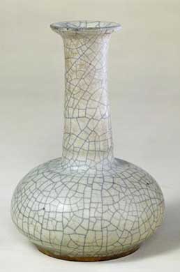 中国收藏网---新闻中心--仿品价格水涨船高金丝铁线话哥窑瓷器