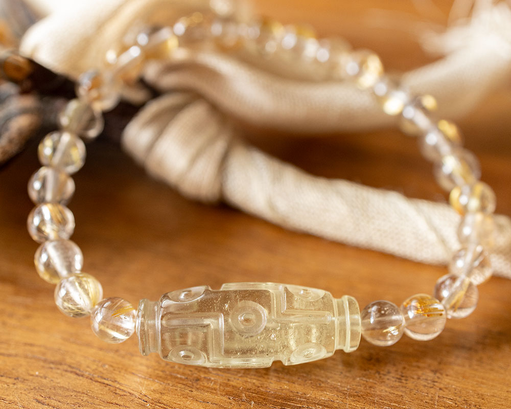 楽天市場】リビアングラス 九眼天珠 ゴールデンルチルクォーツ