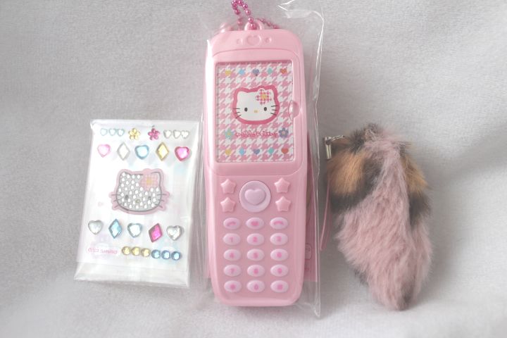 楽天市場】えらんで ハローキティ キティ ガラケーフォトホルダー