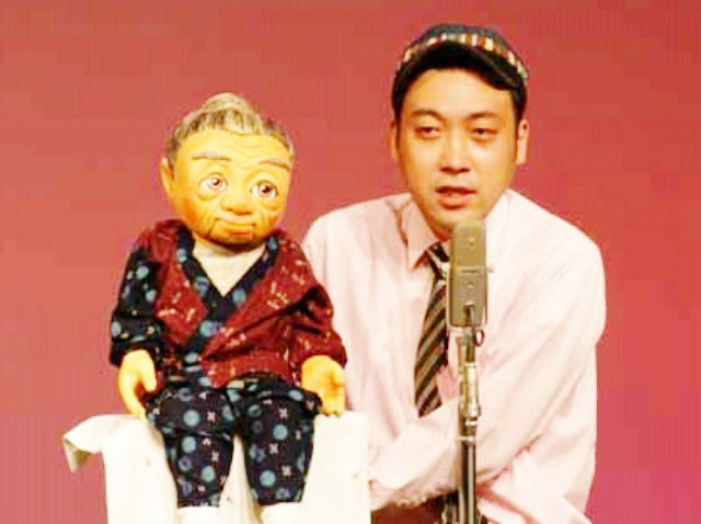 fu01】個性的な人形を操る腹話術 | 大道芸人派遣・パフォーマー出張手配