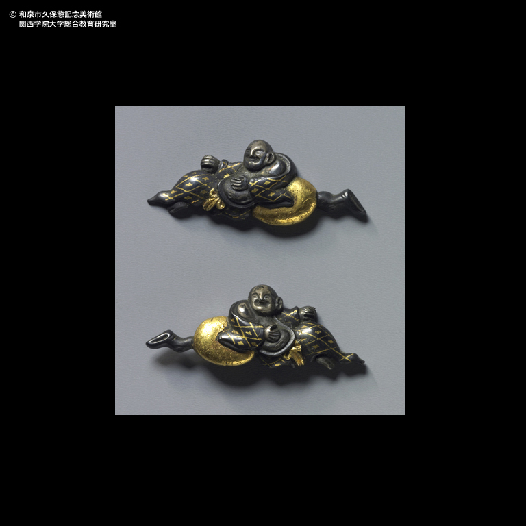 布袋図目貫｜デジタルミュージアム｜和泉市久保惣記念美術館