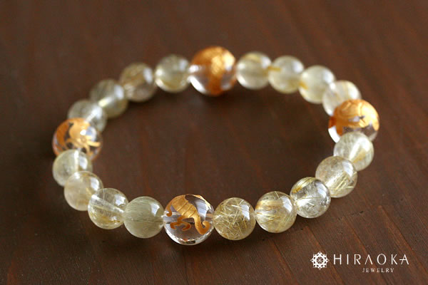 金彫り水晶四神10ミリ＋ルチルクォーツ8ミリ パワーストーン