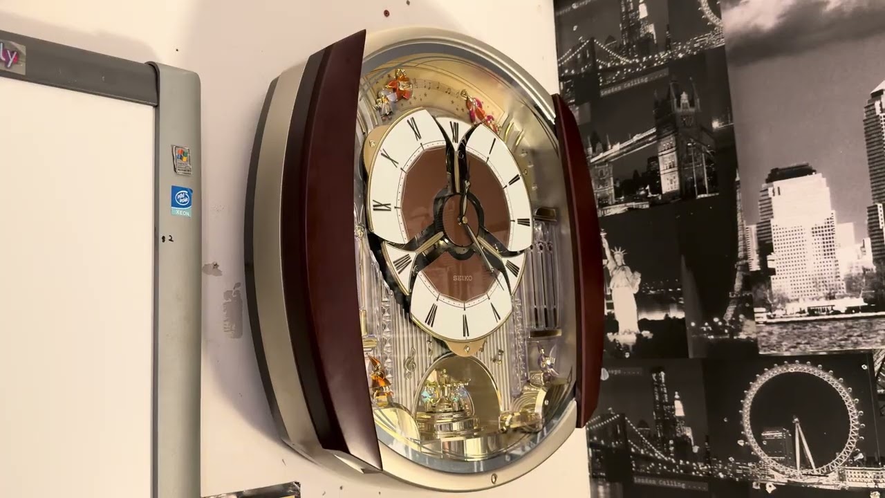 Seiko Melodies In Motion QXM132LRH Wall Clock - YouTube