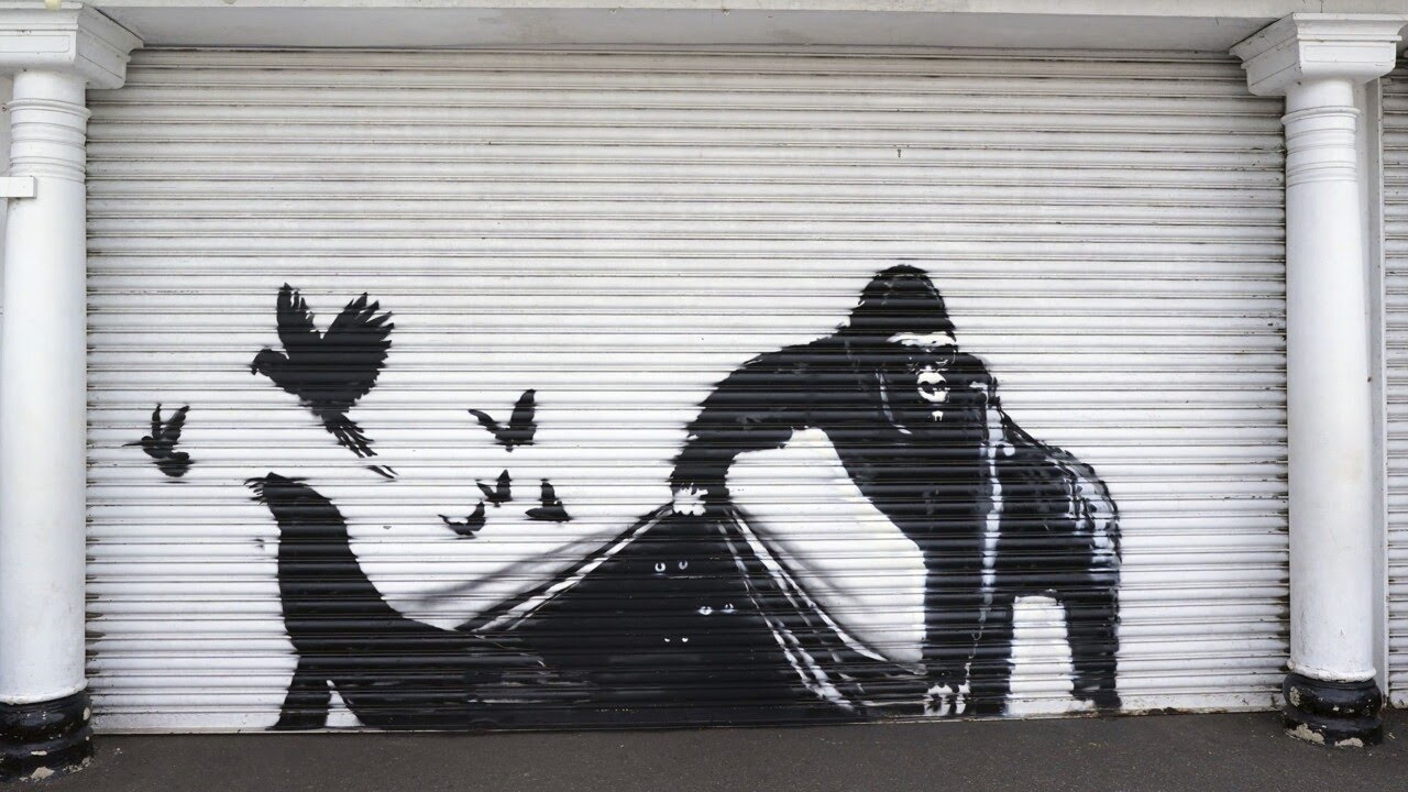 Banksy unveils latest new gorilla art at London Zoo - YouTube