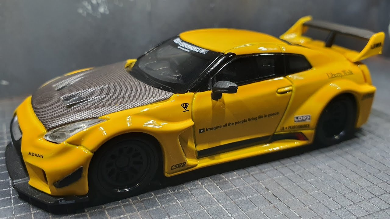 MINI GT LB - Silhouette WORKS GT NISSAN 35GT-RR Yellow / No. 182