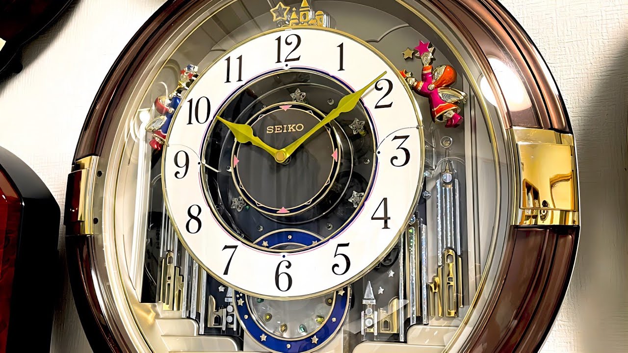 SEIKO FANTASIA RE549G からくり時計 Melodies in Motion - YouTube