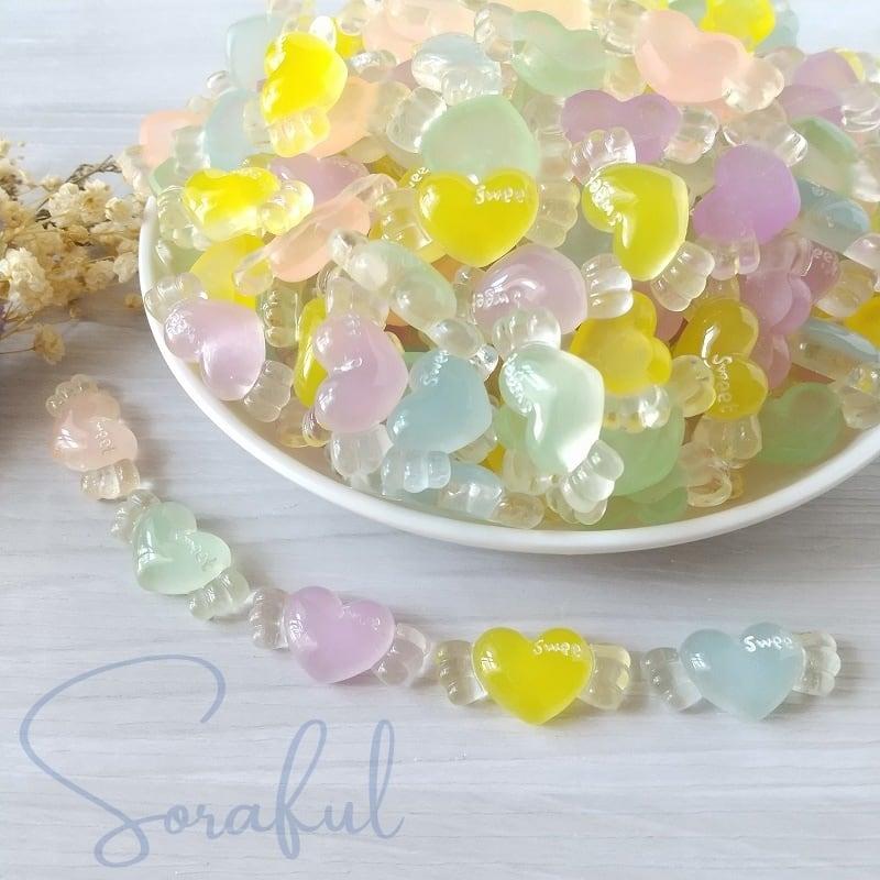 デコパーツ 羽の生えたキャンディーみたいなぷるるんハート クリア