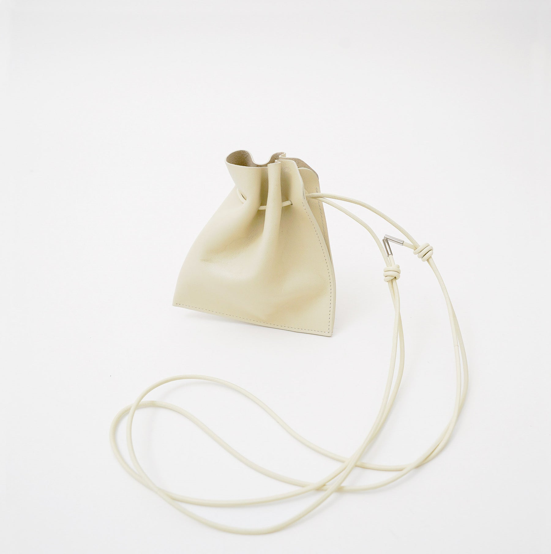 HERRIE KINCHAKU POUCH - XXS / RAPTO FLEX｜レザー ミニ巾着ポーチ 首