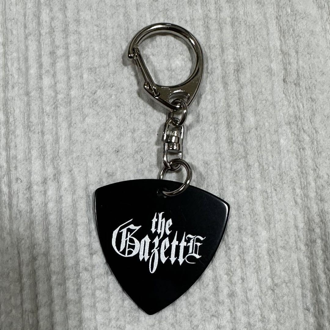 Amazon.co.jp: the GazettE ガゼット ロゴ入り ピックキーホルダー