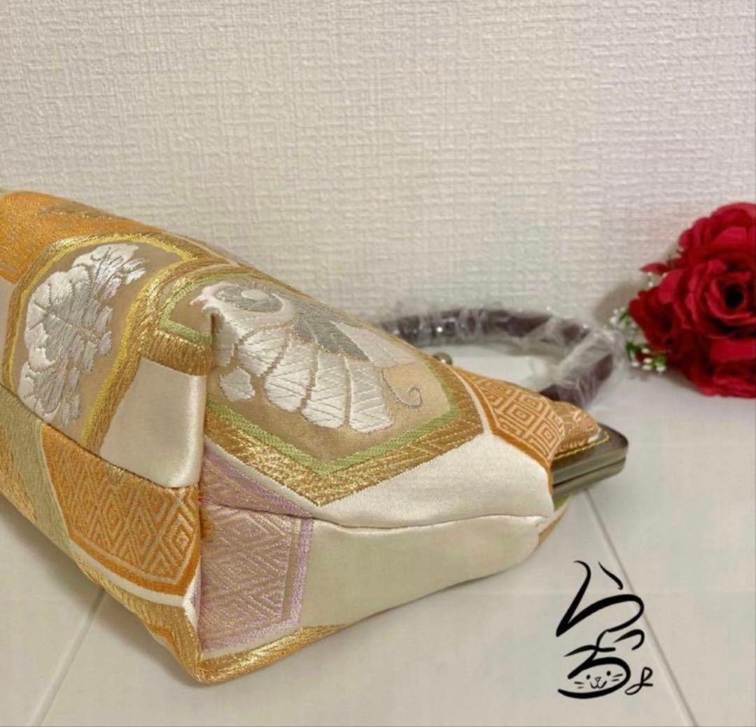 帯リメイク 亀甲に桐菊橘 持ち手付きがま口バッグ - メルカリ