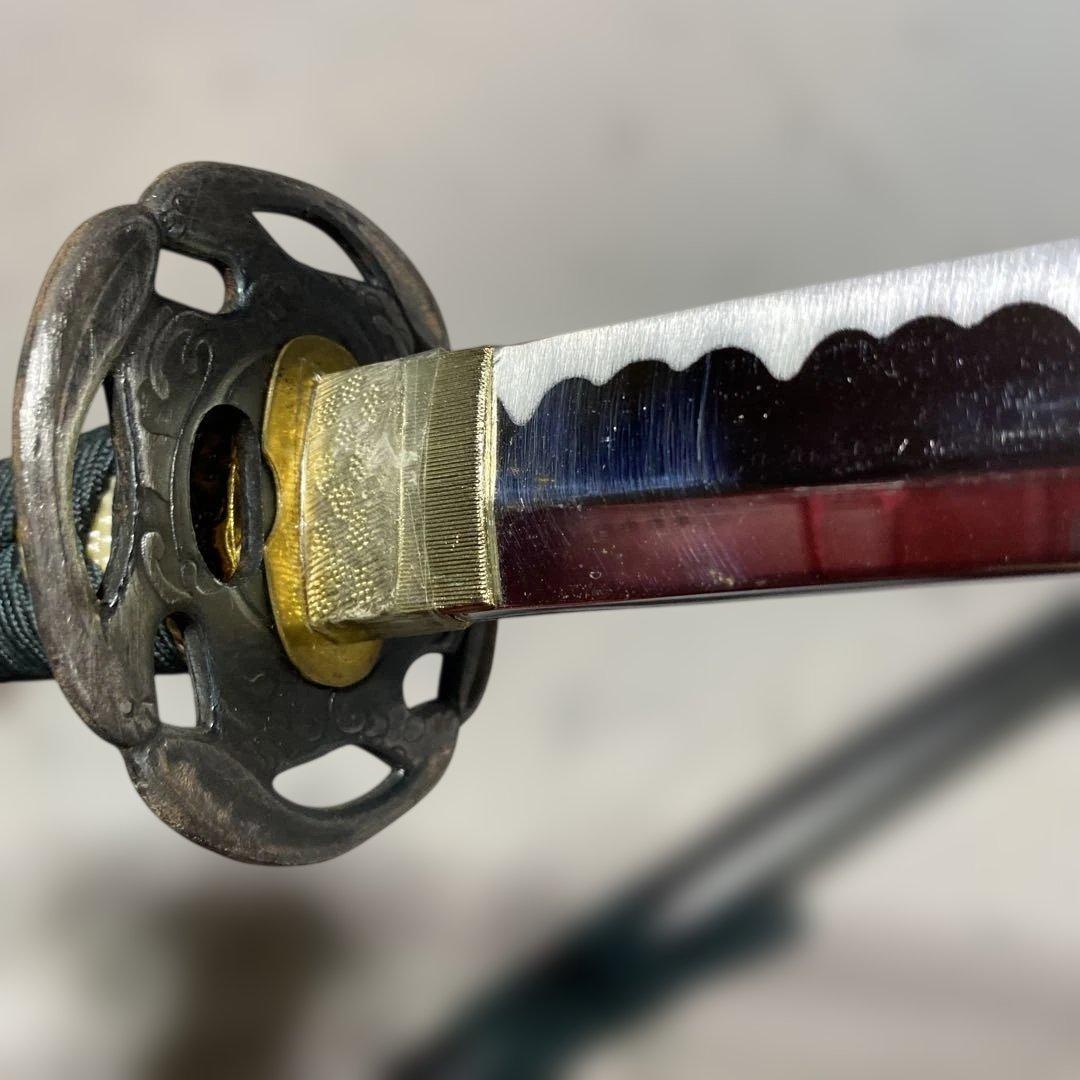 格安模造刀大刀 濃緑柄 波絵透し丸鍔 黒梨地鞘 - メルカリ